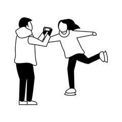 young kids with winter clothes taking picture with cellphone