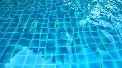 blue water in the pool close up for background
