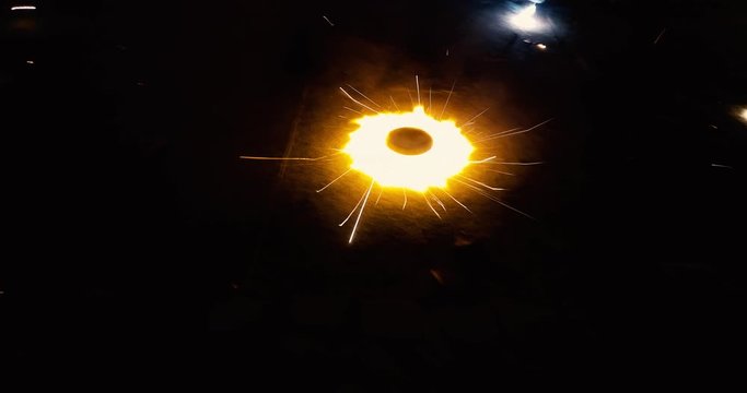 Cracker sparkles spinning isolated on a black background