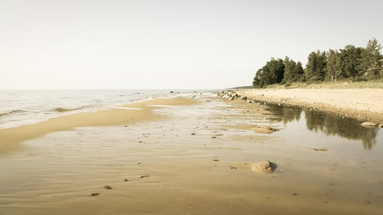 Calm  beach in the sunny summer day. Baltic sea coast, Latvia.