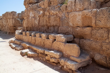 Ancient public latrine/toilet system in the archaeological park of King Herod's harbor town, Caesarea Maritima