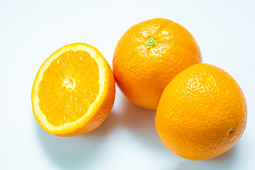 Fresh slice orange tropical fruit on white background