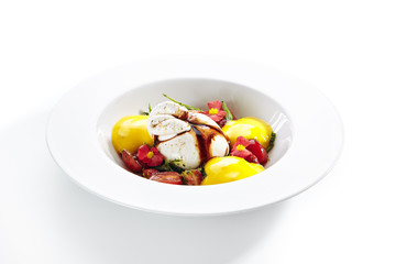 Exquisite serving burrata cheese with tomatoes and mango mousse