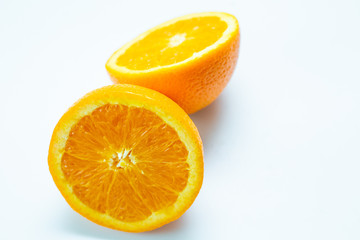 Fresh slice orange tropical fruit on white background