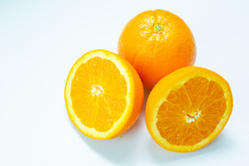 Fresh slice orange tropical fruit on white background