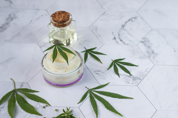 Natural cannabis cream, hemp, moisturizing CBD lotion. Cosmetic product. On a light background