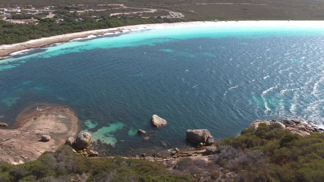Aerial footage of Lucky bay in Esperance's Cape le Grande national park, camping sites visible on in the background. Australia.