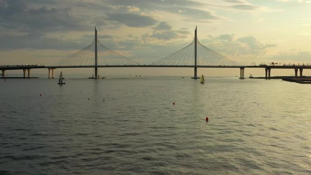 Aerial view of cable-stayed bridge in St.Petersburg during sunset, 4k