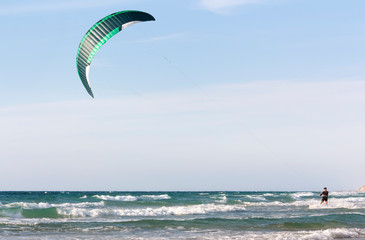 Seascape with kite against sky as background