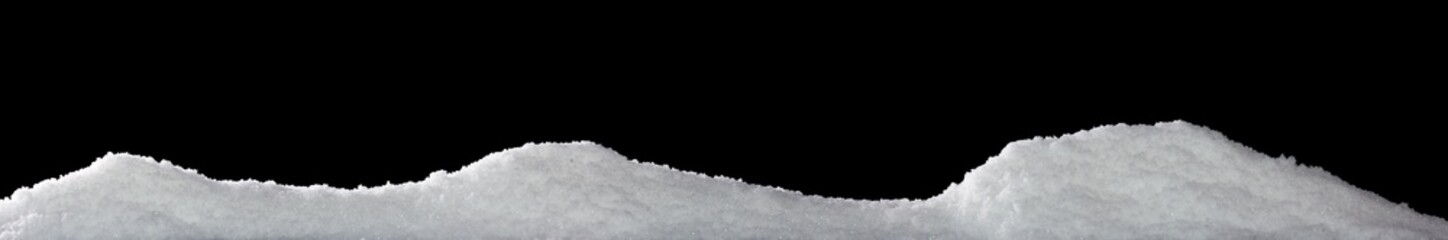 Banner of sparkling fuffy white snow hills isolated on black