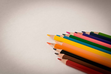 A set of colored pencils. Isolated on white background. Selective focus.