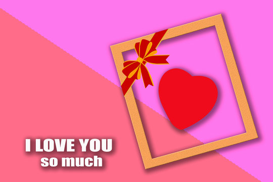 red heart on photo frame with text I LOVE YOU SO MUCH(valentine's dayconcept)