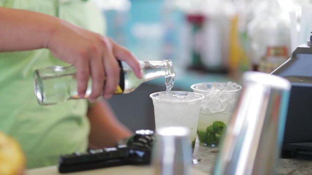Tropical Beach Bartender Mixing Pouring Alcohol Mojito Drink Bubbles Fizzing