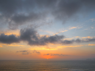 View of a sunset on the coast of the city of Lima
