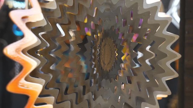 A close up view of a wind spinner.