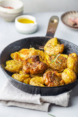 Homemade baked smashed baby potatoes with garlic, salt and herbs