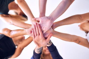 Young beautiful sportwomen doing gesture with hands