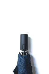 折りたたみ傘の自動開閉持ち手のボタン 縦