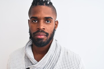 African american man with braids wearing grey sweater over isolated white background with a confident expression on smart face thinking serious