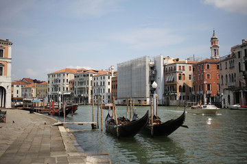Gondolas travelling on Grand Canal Venice surrounding by historical attractive building, Venice, Italy, Commercial advertisement for day trip boat in Europe