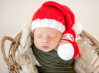 Lovely newborn in santa hat