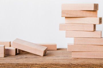 blocks wood on wooded floor white background. picture for add text or graphic design.