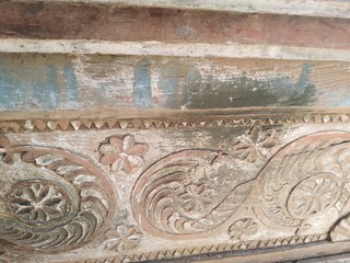 Antique Wooden Carving with Floral and Geometric Patterns