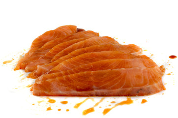 Thin Slices of Raw Salmon Fillet Isolated on White Background