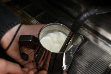 Making coffee in coffeeshop or cafe closeup