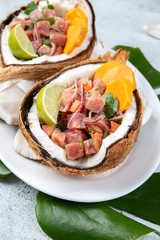 Easter island Tahitian, Hawaiian Tuna Ceviche with sweet potato in Natural zero waste coconuts plates
