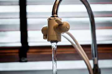 A white water faucet without water