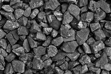 Natural black coals for background. Industrial coals. Volcanic rock backdrop design.