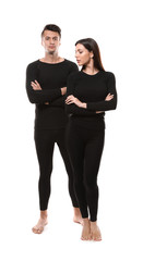 Couple wearing thermal underwear isolated on white