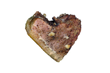 Baked meat in the shape of a heart. Healthy lifestyle or organic food concept.
