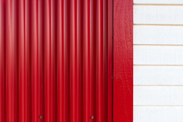 Red and White Metal and Wood Siding