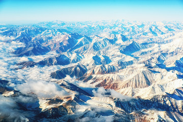 Andes Mountains (Cordillera de los Andes) viewed from an airplane window. - obrazy, fototapety, plakaty