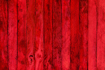 Red wood texture. Background old red panels. 