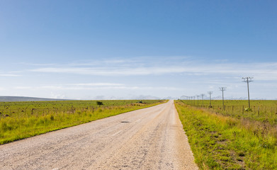 Fototapeta na wymiar View of an empty country highway road