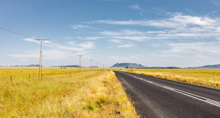 Fototapeta na wymiar View of an empty country highway road