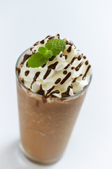 Chocolate frappuccino with whipped cream and chocolate sauce 