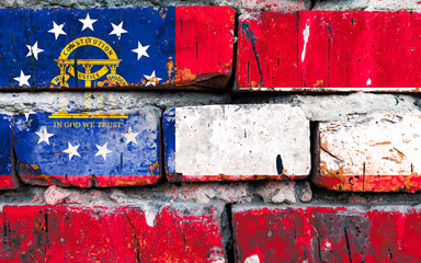 Georgia grunge, damaged, scratch, old style united states flag on brick wall.