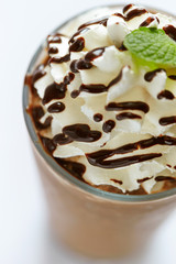 Chocolate frappuccino with whipped cream and chocolate sauce 