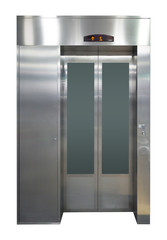 An empty modern elevator or lift with metal doors. Isolated