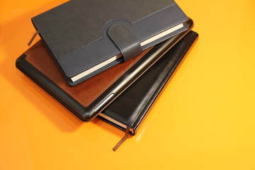 books on the orange table