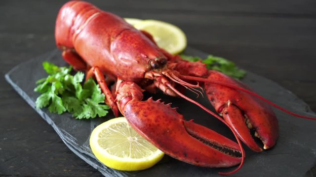 freshly boiled lobster with vegetable and lemon