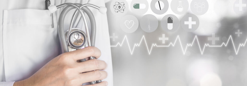 healthcare banner background with doctor hand hand holding stethoscope at a hospital