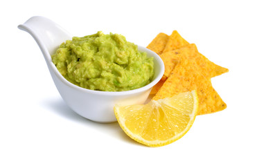 Guacamole with nachos. Isolated on white background