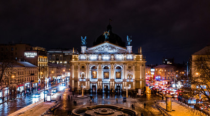 Aerial view on Lviv Opera at night from drone