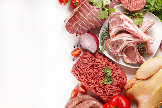 assorted of raw meats, beef- sausage- chicken isolated on white background