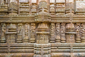 Fototapeta na wymiar View at the Decorative stone relief in Konark Sun Temple complex - Odisha,India